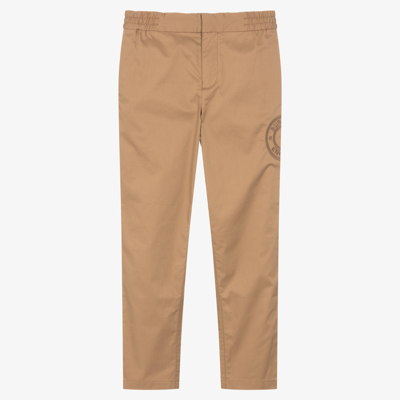 Shop Burberry Teen Boys Beige Cotton Logo Trousers