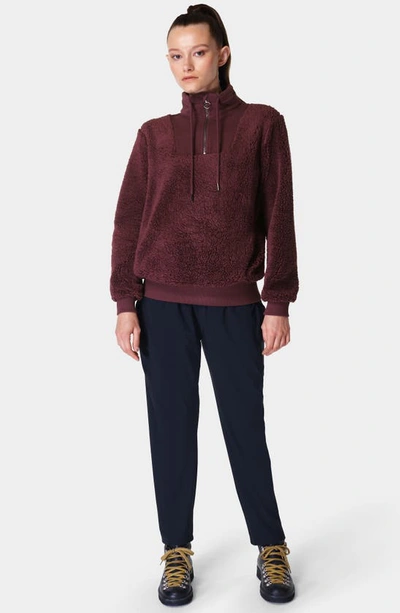 Shop Sweaty Betty Faux Shearling Quarter Zip Pullover In Umbra Red