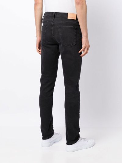 Shop Citizens Of Humanity London Tapered Jeans In Black