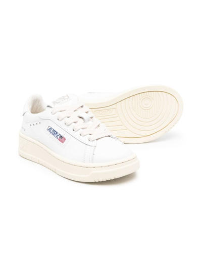 Shop Autry Low-top Leather Sneakers In White