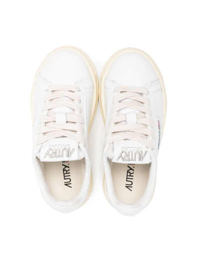 Shop Autry Low-top Leather Sneakers In White