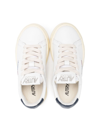 Shop Autry Low-top Leather Sneakers In White