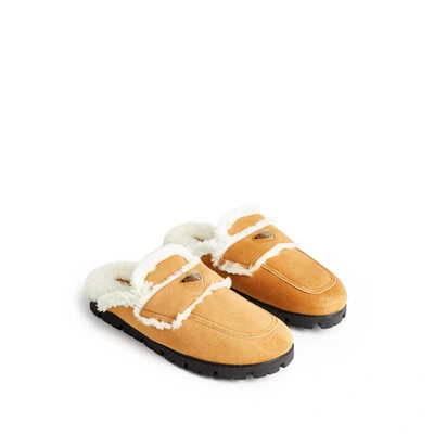 Shop Prada Sheepskin Slippers In Brown