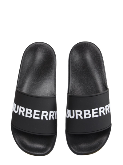 Shop Burberry Slide Sandals With Logo In Black