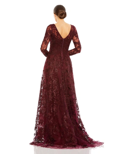 Shop Mac Duggal Embellished Illusion Long Sleeve V Neck Gown In Mahogany