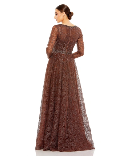 Shop Mac Duggal Embellished Illusion Long Sleeve V Neck Gown In Chocolate