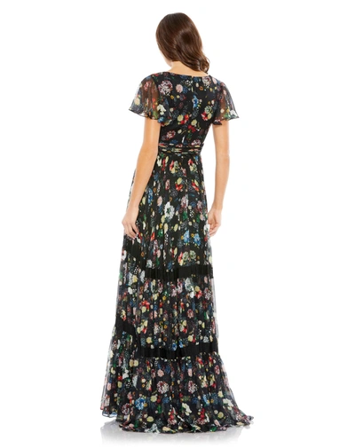 Shop Mac Duggal Floral Print Pleated Wrap Over Butterfly Sleeve Maxi Dress In Black Multi