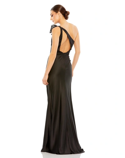 Shop Ieena For Mac Duggal Sequined Bow Detail One Shoulder Trumpet Gown In Black