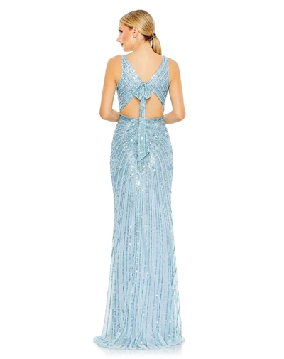 Shop Mac Duggal Sequined Faux Wrap Sleeveless Gown In Ice Blue