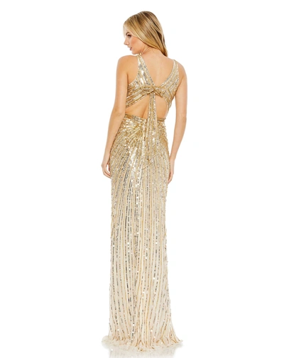 Shop Mac Duggal Sequined Faux Wrap Sleeveless Gown In Gold