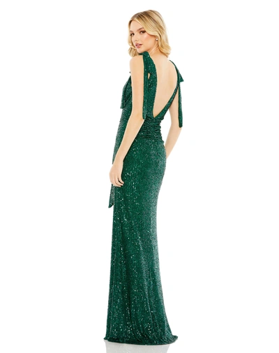 Shop Ieena For Mac Duggal Sequined Low Back Bow Shoulder Gown In Emerald