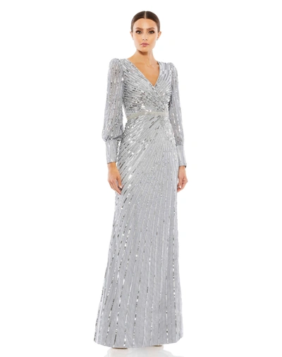 Shop Mac Duggal Sequined Wrap Over Bishop Sleeve Gown In Silver