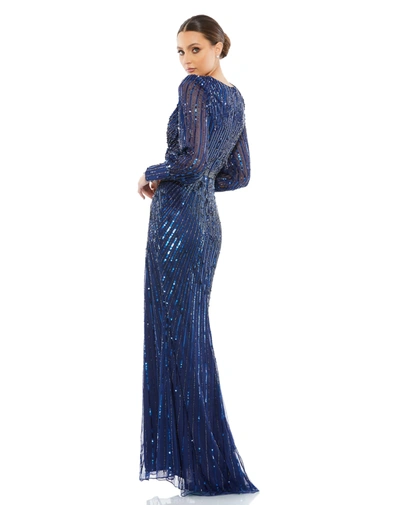 Shop Mac Duggal Sequined Wrap Over Bishop Sleeve Gown In Midnight