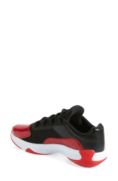 Shop Jordan Air  11 Cmft Low Sneaker In Black/ Gym Red/ White