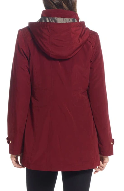 Gallery Water Resistant Zip Front Rain Jacket In Merlot