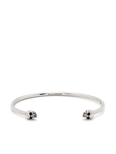 Shop Alexander Mcqueen Twin Skull Cuff Bracelet In Silver