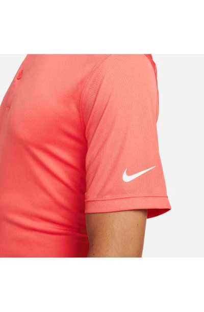 Shop Nike Dri-fit Piqué Golf Polo In Magic Ember/ White