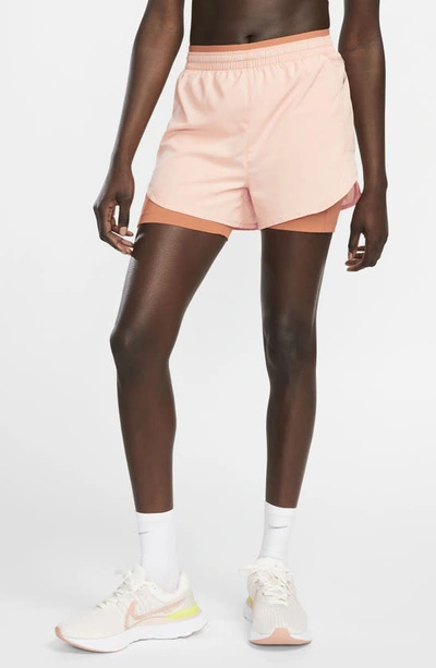 Shop Nike Tempo Luxe 2-in-1 Shorts In Arctic Orange/ Orange Trance