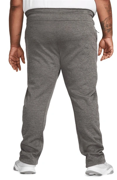 Shop Nike Therma-fit Sweatpants In Charcoal Heather/ Grey/ Black