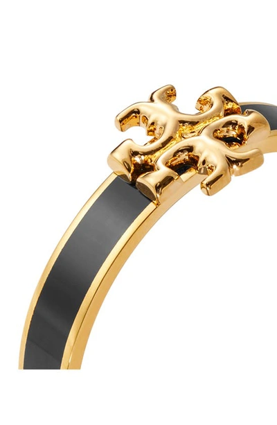 Shop Tory Burch Kira Stackable Enamel Ring In Tory Gold / Black