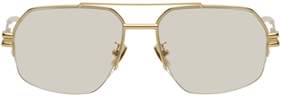 Shop Bottega Veneta Gold Aviator Sunglasses In Gold-gold-yellow