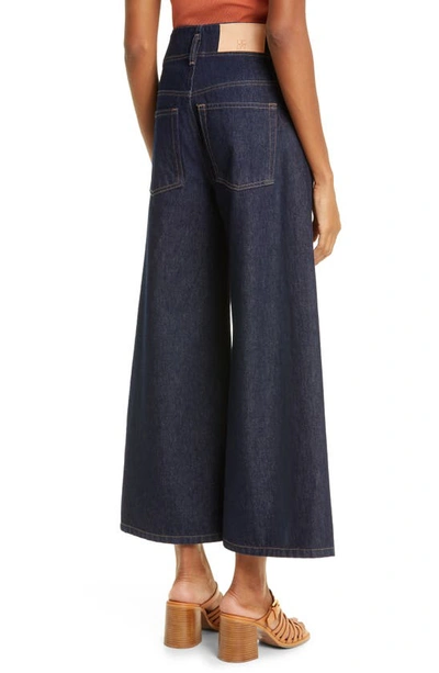 Shop Ulla Johnson The Yvette Flare Ankle Jeans In Tigris Rigid Wash