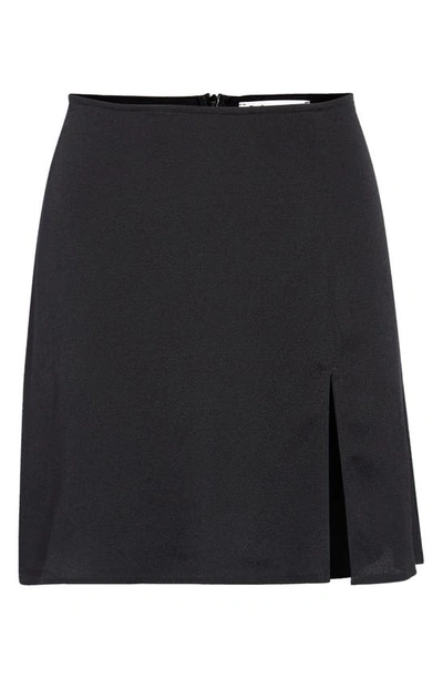Shop Reformation Margot Miniskirt In Black
