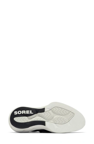 Shop Sorel Explorer Defy Low Sneaker In Black/ White