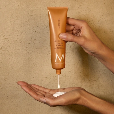 Shop Moroccanoil Hand Cream Ambre Noir In 3.4 Fl oz | 100 ml