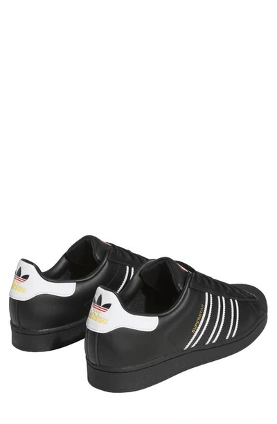 Shop Adidas Originals Superstar Sneaker In Black/ White/ Team Power Red