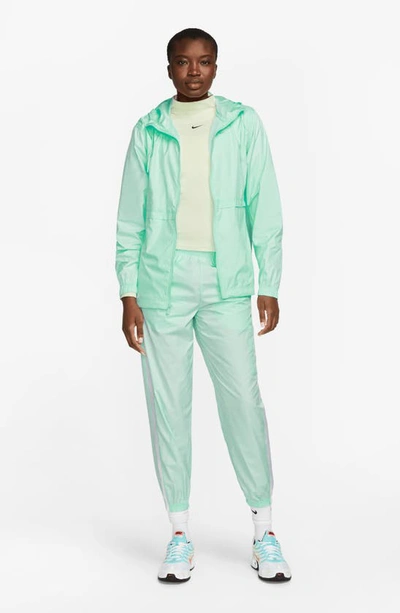 Shop Nike Repel Water-resistant Windbreaker Jacket In Mint Foam/ White