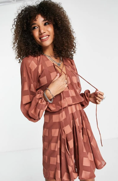 Shop Asos Design Check Long Sleeve Godet Minidress In Brown