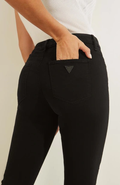 Shop Guess Sexy Curve Skinny Jeans In Black