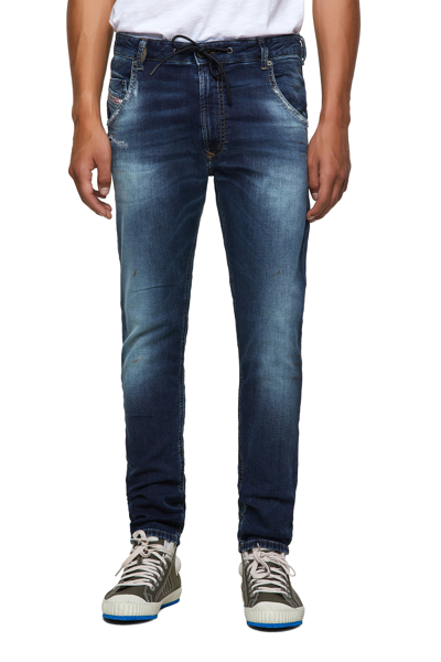 Shop Diesel Tapered Krooley Jogg Jeans In Blue