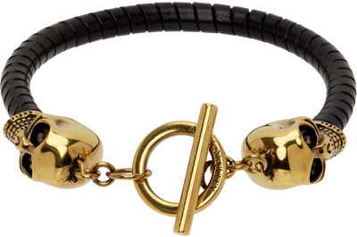 Shop Alexander Mcqueen Black & Gold T Bar Skull Bracelet In 1000 Black