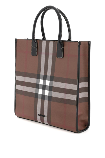 Shop Burberry Exaggerated Check Coated Canvas Tote Bag In Brown,black