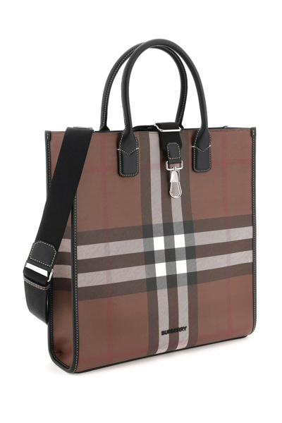Shop Burberry Exaggerated Check Coated Canvas Tote Bag In Brown,black