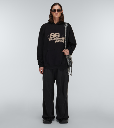 Shop Balenciaga Logo Cotton Hoodie In Black/ecru