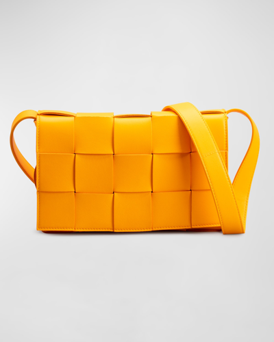 Shop Bottega Veneta The Cassette Intrecciato Crossbody Bag In Tangerine/gold