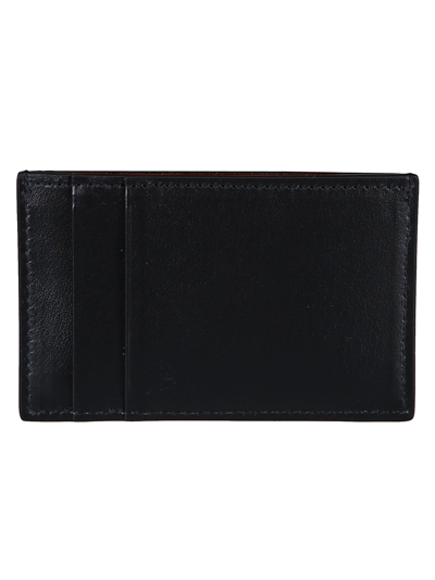 Shop Alexander Mcqueen - Logo-embossed Cardholder In Black
