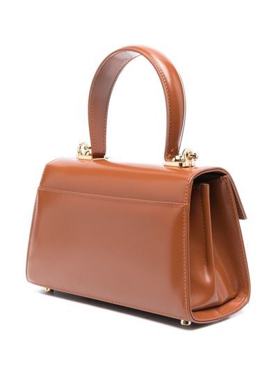 Shop Ferragamo Iconic Leather Crossbody Bag In Brown