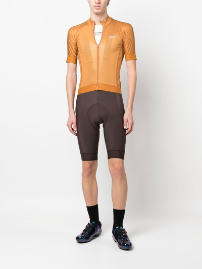 Shop Pas Normal Studios Essential Thermal Cycling Bib Shorts In Brown