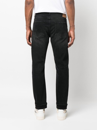 Shop Tela Genova Light-wash Strap Detail Jeans In Black