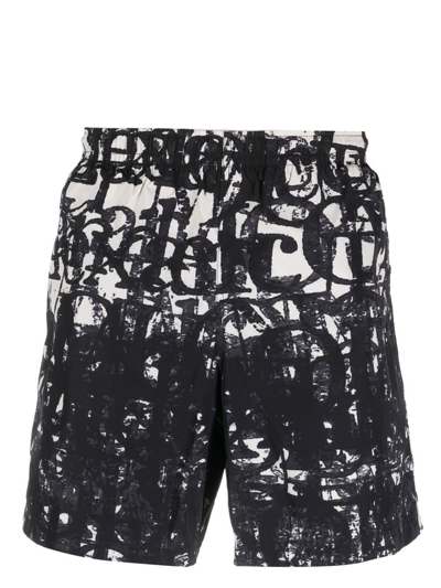 Shop Alexander Mcqueen Logo-print Swim Shorts In Black