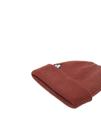 Shop Nike Acg Ribbed-knit Beanie In Brown