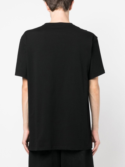 Shop Alexander Mcqueen Logo-print T-shirt In Black