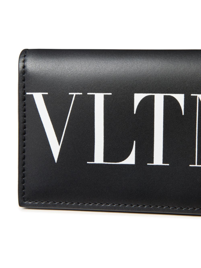 Shop Valentino Vltn Leather Wallet In Black