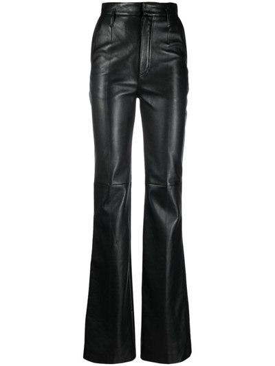 Shop Saint Laurent Leather Bootcut Trousers In Black