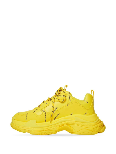 Shop Balenciaga Triple S Logo Sneakers In Yellow