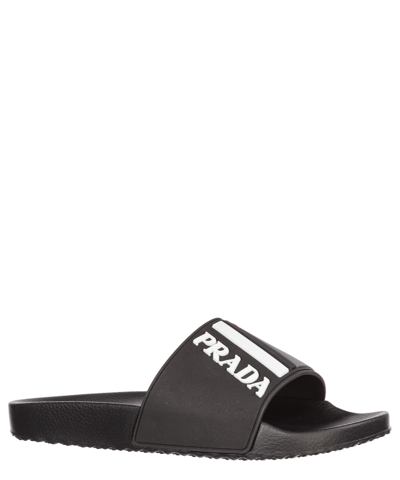 Shop Prada Slides In Black